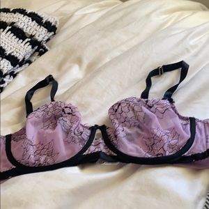 Purple and black lace bra